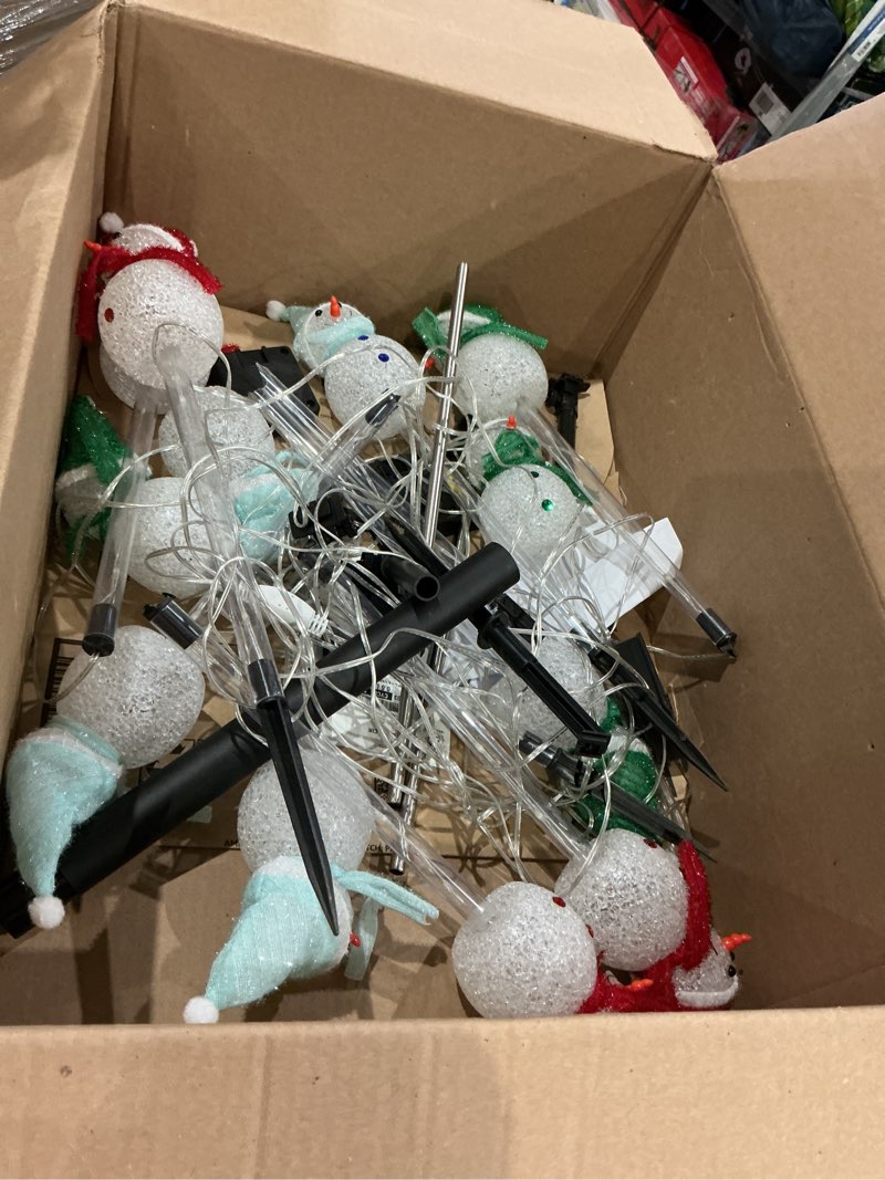Condition photo showing Good Condition for dazzle bright solar christmas pathway lights outdoor, 6 pack white led snowman stake lights christmas decorations, waterproof solar walkway landscape light for xmas patio yard garden porch