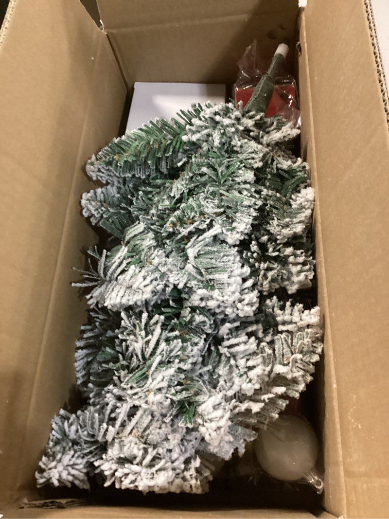 Condition photo showing Good Condition for Dolicer Musical Small Christmas Tree, 2FT Flocked Table Top Christmas Trees with 30 LED Lights, Full Realistic Artificial Mini Xmas Tree with Rotating Music Base for Small Space Holiday Home Decor