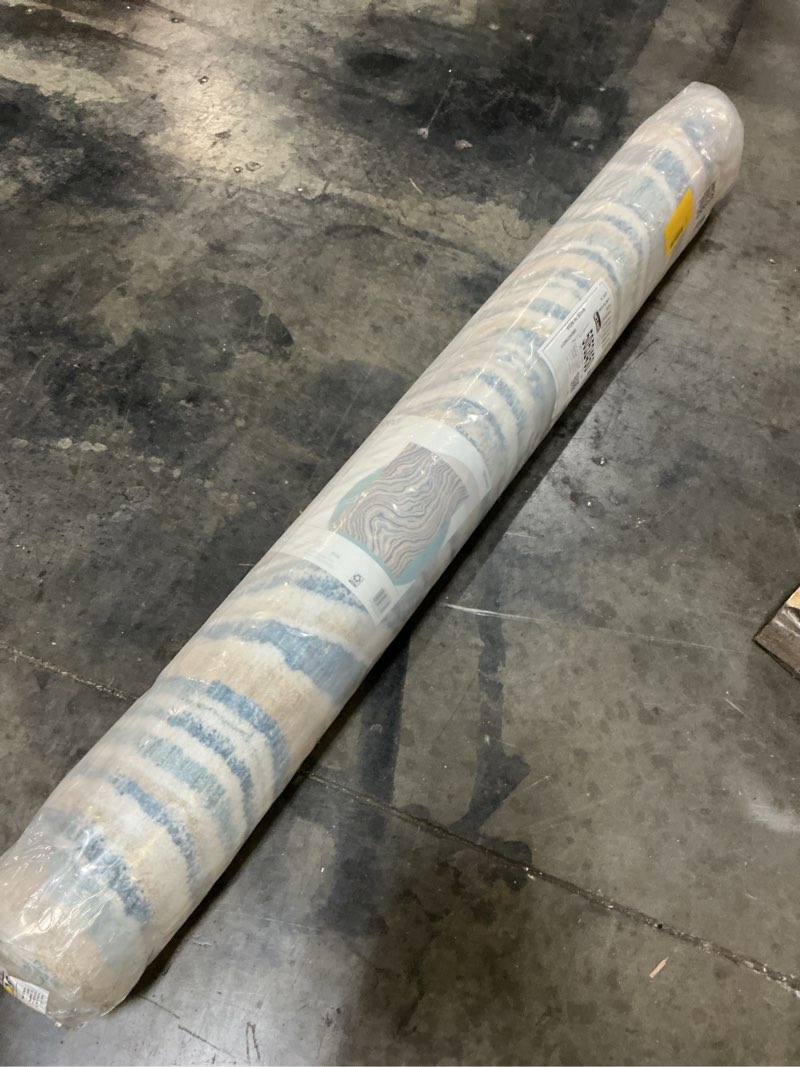 Condition photo showing New/Like New for origin 21 coastal tides 5 x 7 (ft) blue indoor abstract mid-century modern area rug