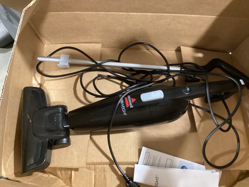 Condition photo showing As Is for bissell 2033m featherweight stick lightweight bagless vacuum and electric broom with crevice tool for hard floors and carpets, black