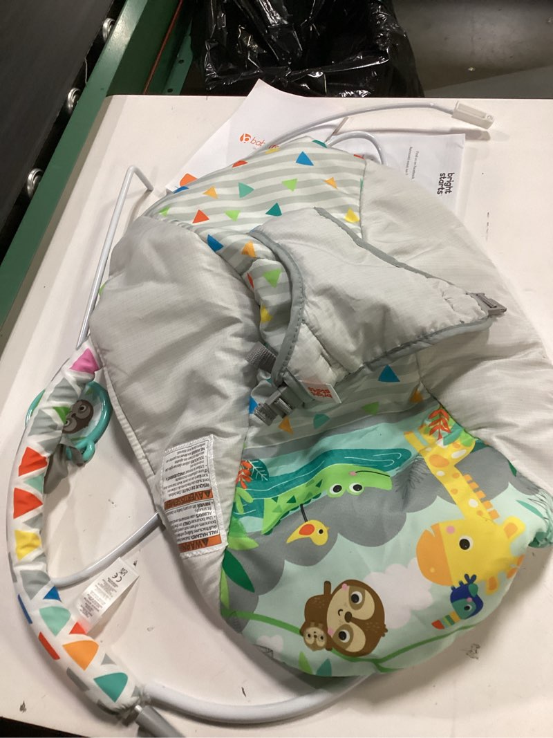 Condition photo showing As Is for bright starts baby bouncer soothing vibrations infant seat - removable -toy bar, nonslip feet, 0-6 months up to 20 lbs (safari fun)