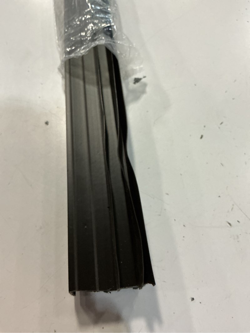 Condition photo showing As Is for m-d building products brown vinyl u-shaped bottom for doors 36 in. l x 1.13 in.