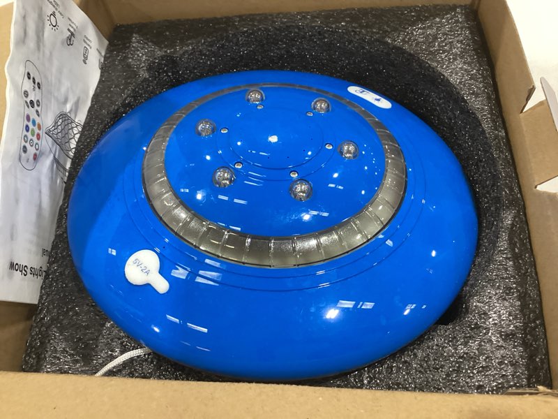 Condition photo showing As Is for floating pool fountain with lights show, 9 pool light modes and 3 fountain modes with remote for inground above ground pool, upgraded rechargeable pool fountains with anchor-1 pc