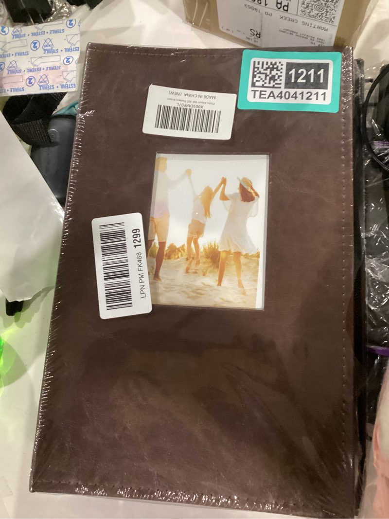 Condition photo showing New/Like New for Ywlake Photo Album 4x6 300 Pockets, Leather Photo Albums Holds 300 Horizontal Only Pictures Brown 300 Pockets Brown