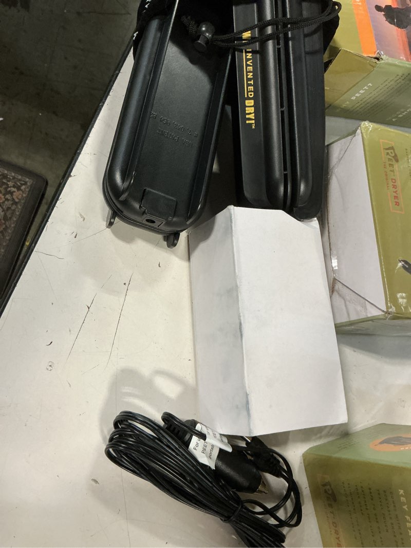 Condition photo showing Good Condition for peet, go! portable 2-shoe dryer, electric boot dryer with vehicle power adapter, dryer for work boots, sneakers, ski boots cleats, athletic shoes
