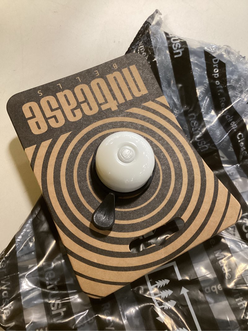 Condition photo showing As Is for Nutcase Large Beel, Thumbdinger white 