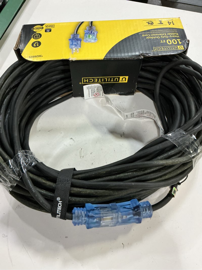 Condition photo showing As Is for utilitech 100-ft 14 / 3-prong indoor/outdoor sjeoow heavy duty lighted extension cord