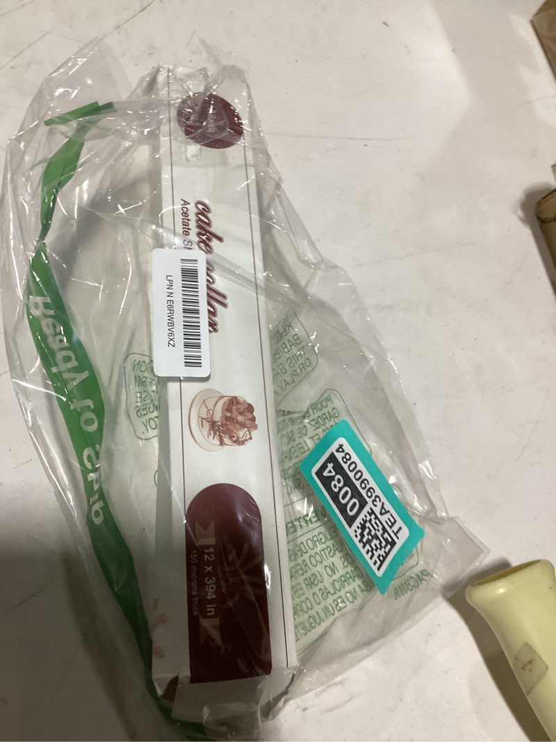 Condition photo showing As Is for cake collars 12 x 394inch (5.9 mil thick) transparent acetate sheets rolls for baking surrounding edge decorating 12in x 394in