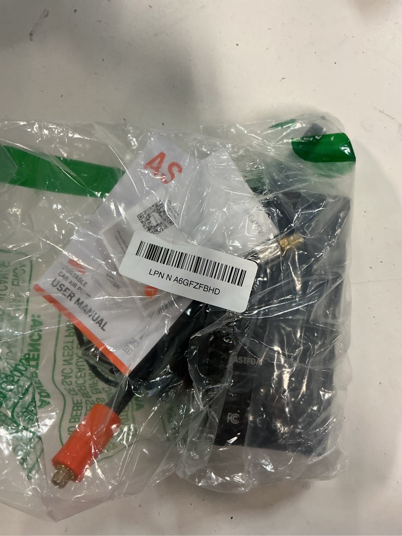 Condition photo showing As Is for astroai s8 air jump starter with air compressor, 1500a peak car battery jump starter portable (6.0 gas/3.0l diesel) with 150psi cordless auto-shutoff tire inflator, 12v battery charger booster(orange)