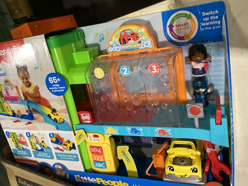 Condition photo showing Good Condition for fisher-price little people toddler toy light-up learning garage playset with smart stages, car & ramp for pretend play kids ages 1+ years simplified packaging