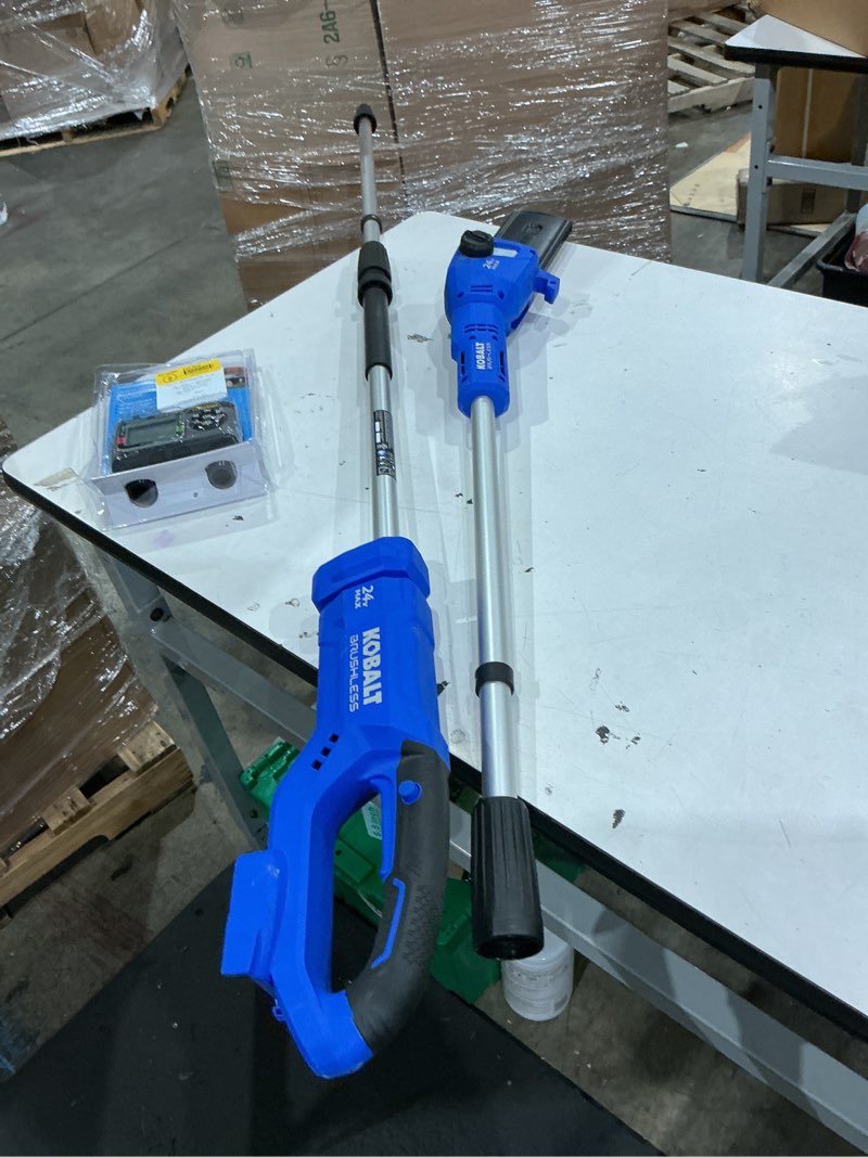 Condition photo showing As Is for kobalt 24-volt 8-in 2 ah electric pole saw battery included , charger included