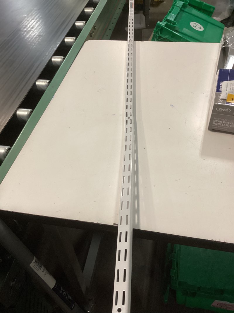 Condition photo showing New/Like New for shelftrack 60 in. x 1 in. white standard