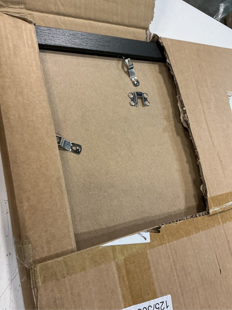 Condition photo showing Good Condition for 19.25x26.75 picture frame for wall display, 19.25x26.75 black picture frame with shatter resistant plexiglass, stable and sturdy puzzle frame for wall display, handpicked gift collection