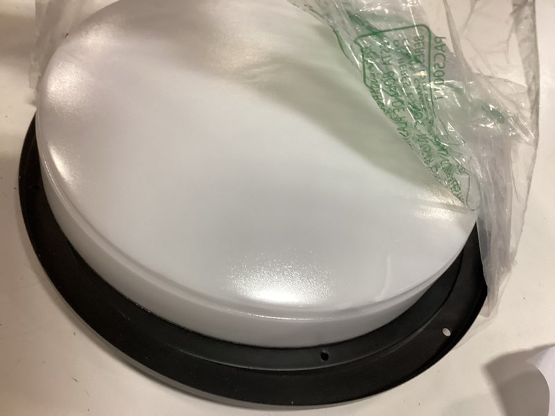 Condition photo showing As Is for flush mount led ceiling/wall light
