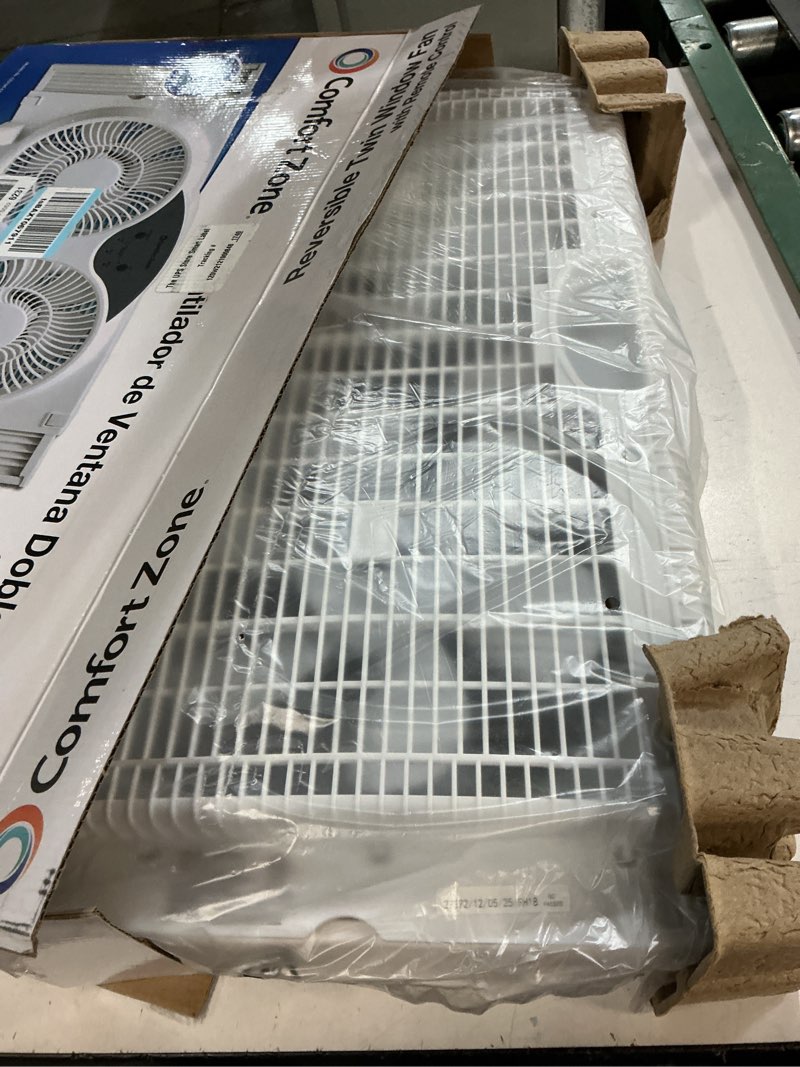 Condition photo showing New/Like New for comfort zone 9  3-speed reversible twin window fan with remote control  white