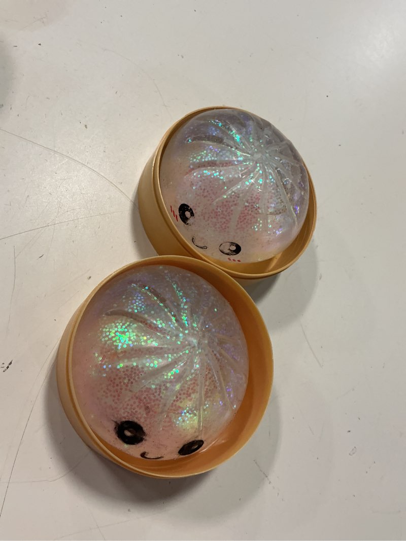 Condition photo showing Good Condition for glitter dumpling squishy mystery box 2 pcs - 2026 upgraded dumplings squishes for adults teens squeeze easter basket stuffers & stocking stuff smiling white and sad blue