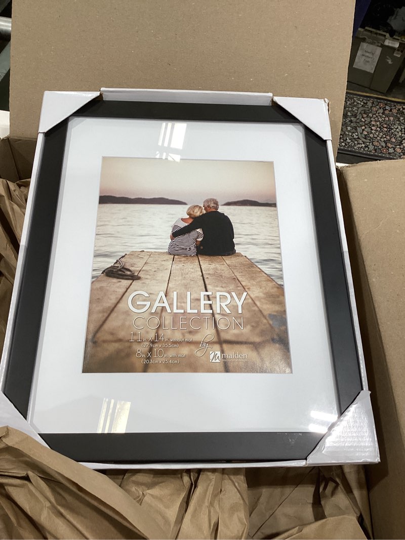 Condition photo showing Good Condition for Malden 11x13 Matted Picture Frame - Made to Display Pictures 8x10 with Mat, or 11x13 without Mat - Black Black Made to Display Pictures 8x10 with Mat, or 11x13 without Mat