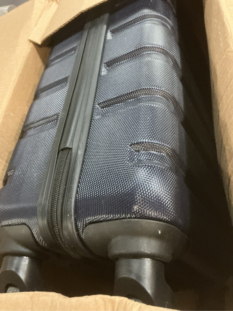 Condition photo showing As Is for wrangler 21.5" spinner carry-on luggage, navy blue dark navy