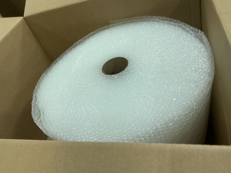 Condition photo showing New/Like New for amazon basics bubble wrap for moving, packing, shipping and storage, perforated protective cushioning for fragile items, 12-inch x 175-ft long roll, small 3/16", clear