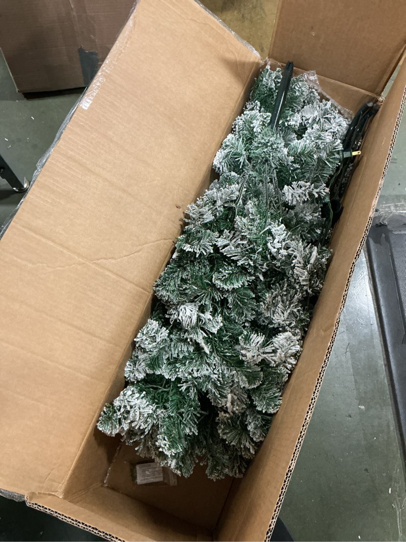 Condition photo showing As Is for National Tree Company 6 ft Pre-Lit Flocked Acacia Slim Artificial Christmas Tree, 250 Clear Lights