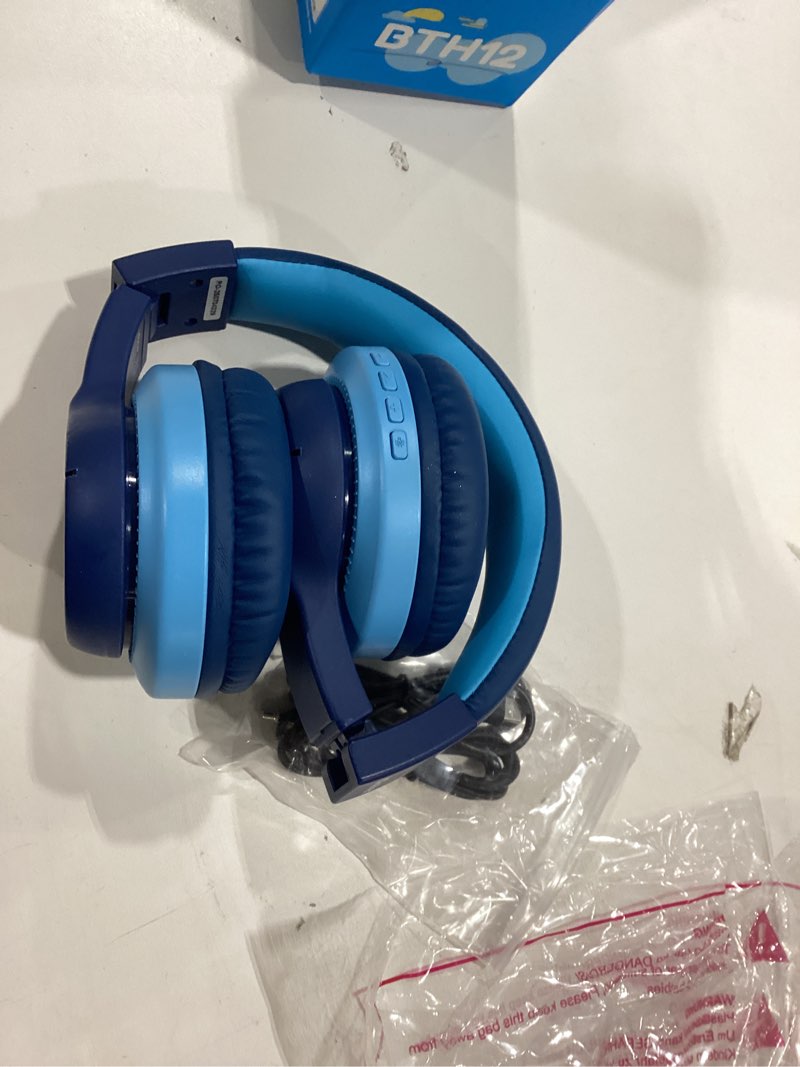 Condition photo showing As Is for iclever bth12 kids bluetooth headphones,colorful led lights kids headphones wireless,74/85dba safe volume,85h playtime,fast charging,bluetooth 5.2,over ear,built-in mic for ipad/tablet/airplane,blue b-blue