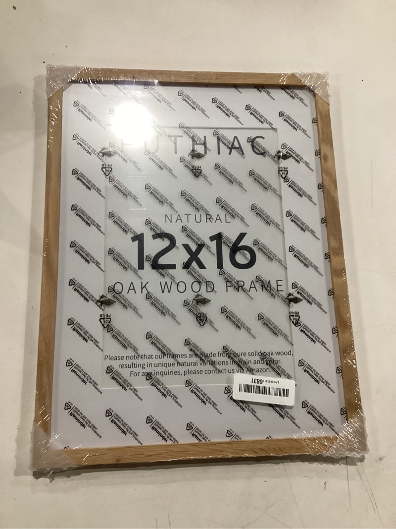Condition photo showing New/Like New for puthiac 12x16 solid oak wood picture frame, fits 8x12 with mat or 12x16 without mat, wall display only, vertical or horizontal, plexi front, 1 pack, natural oak beige-1p 12x16