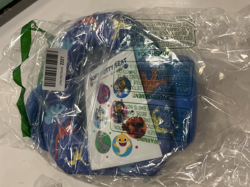 Condition photo showing New/Like New for nbc universal jurassic world soft potty seat standard