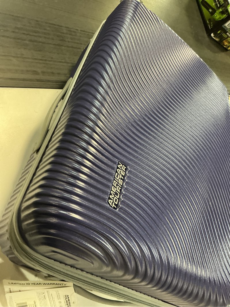 Condition photo showing As Is for american tourister color waves medium checked suitcase with spinner wheels - dusk purple