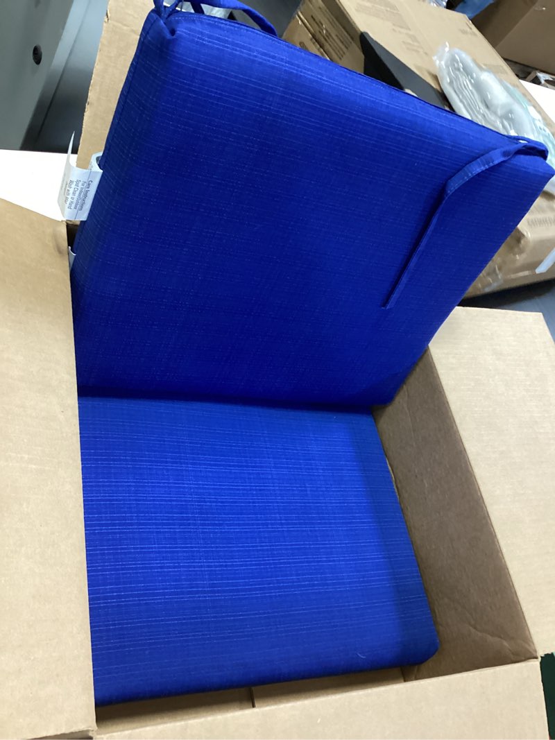 Condition photo showing New/Like New for Pillow Perfect Fresco Solid Indoor/Outdoor Patio Seat Cushions Plush Fiber Fill, Weather and Fade Resistant, Square Corner - 16" x 18.5", Blue, 2 Count Blue Square Corner - 16" x 18.5"