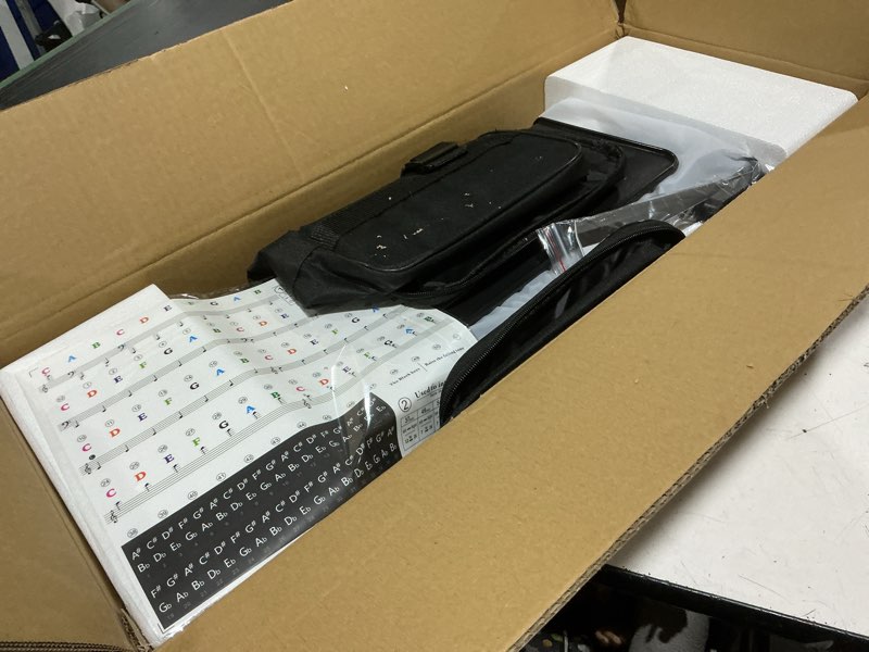 Condition photo showing Good Condition for portable piano keyboard, semi-weighted folding digital piano 88 key, full size, wood grain, electric piano keyboard w/midi bluetooth, suitable for adult, toddler 88 key black