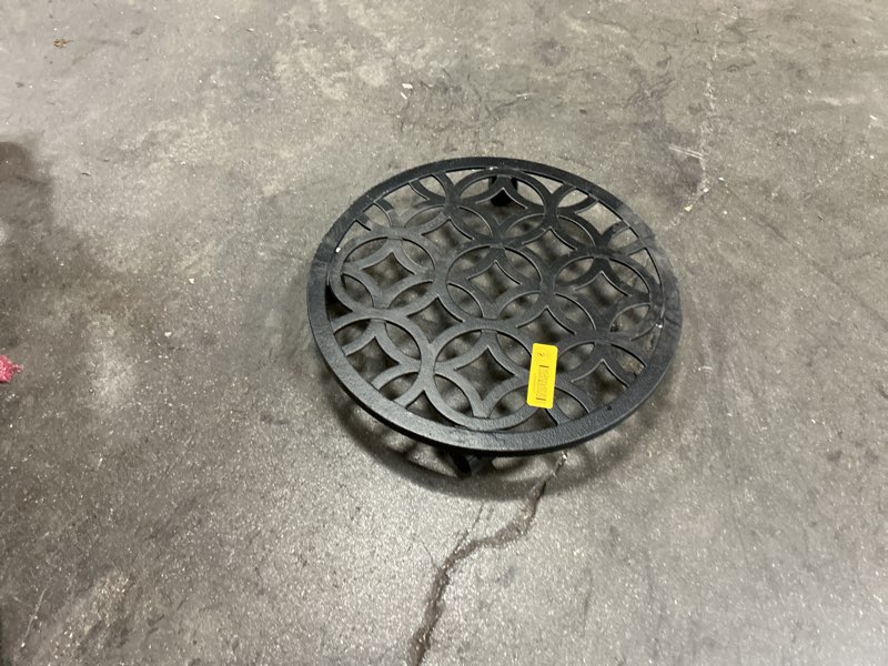 Condition photo showing As Is for black metal plant caddy
