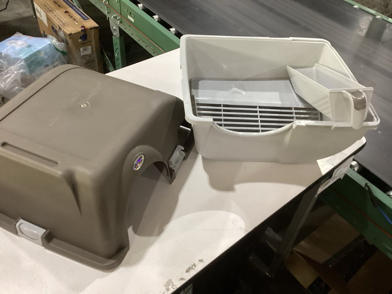 Condition photo showing New/Like New for omega paw self cleaning litter box, omega paw roll 'n clean litter box, regular size for kittens and cats 10 lbs and under, brown color, model nra15 v5.0