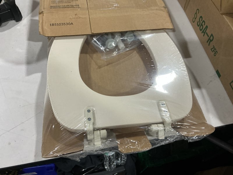 Condition photo showing Good Condition for mayfair padded toilet seat, cushioned soft vinyl over wood core seat, secure hinges, easy clean, made in usa, elongated, bone