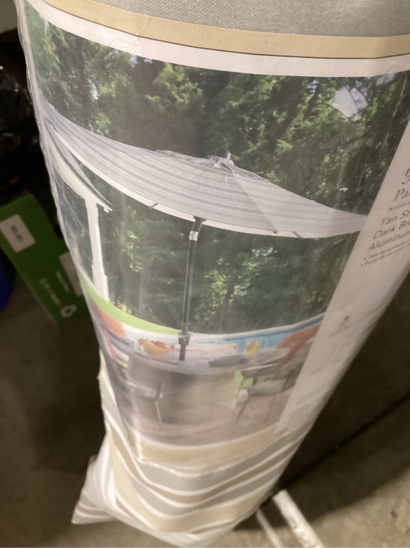 Condition photo showing As Is for 9ft umbrella