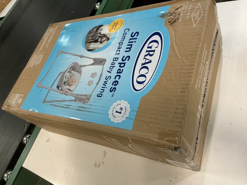 Condition photo showing New/Like New for Graco Slim Spaces Compact Baby Swing, Space Saving Portable Bay Swing with Height Adjustable Legs & Soft Toys, Reign