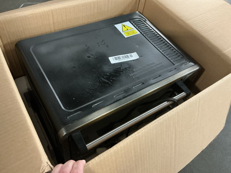 Condition photo showing As Is for TOSHIBA AC25CEW-BS Large 6-Slice Convection Toaster Oven Countertop, 10-In-One with Toast, Pizza and Rotisserie, 1500W, Black Stainless Steel, Includes 6 Accessories Black Stainless Steel 25L-BS