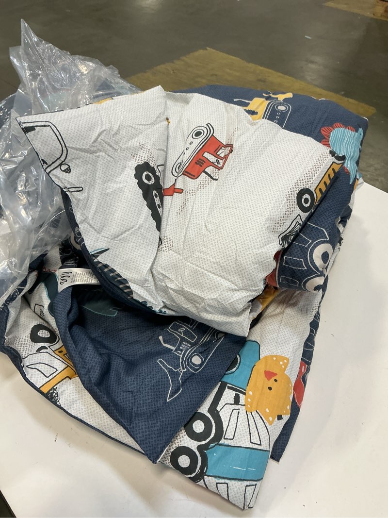 Condition photo showing As Is for DJY Cotton Twin Bedding Set, Dinosaur Cars Reversible Twin Comforter Set for Kids Boys Girls, 4 Pieces Bed in a Bag Includes Quilted Comforter, Flat Sheet, Fitted Sheet and Pillowcase Twin(4 pcs) Dinosaur & Car