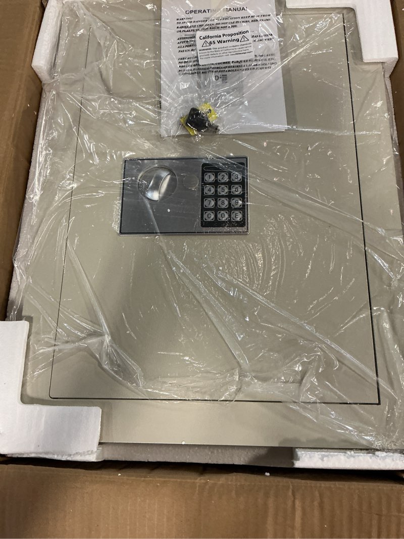Condition photo showing New/Like New for in-wall safe with keypad and 2 manual override keys - protect money, jewelry, and passports at home or business by paragon safes (white)