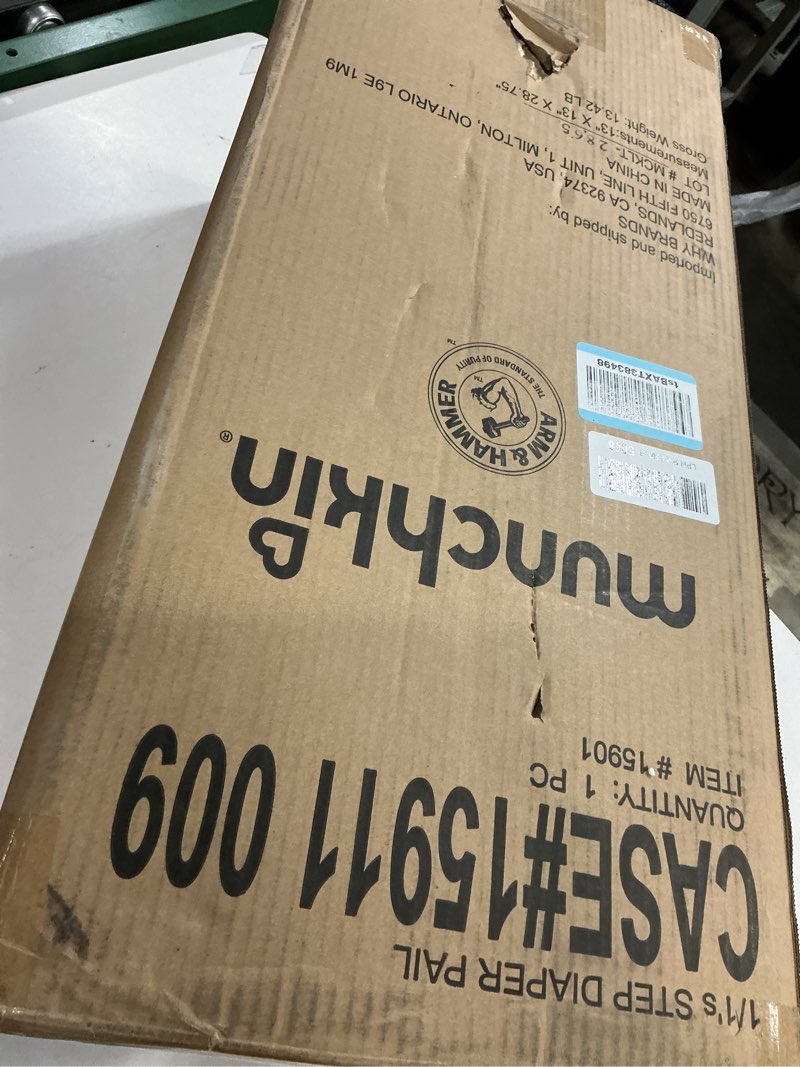 Condition photo showing As Is for munchkin® step™ diaper pail powered by arm & hammer, #1 in odor control, award-winning, includes 1 snap, seal & toss™ bag, 1 starter refill ring, and 1 puck™ baking soda cartridge