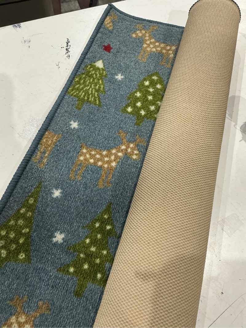 Condition photo showing Good Condition for ewcon holiday delight blue, reindeer and christmas tree 30”x46” area rug