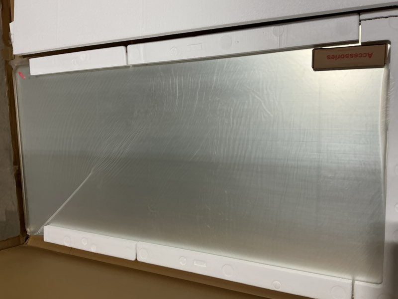 Condition photo showing Good Condition for loaao 60x28 inch bathroom mirror with wood grain colored metal frame, rounded rectangle metal framed bathroom mirror, anti-rust, hangs horizontally or vertically, tempered glass wood grain colored 60"l x 28"w