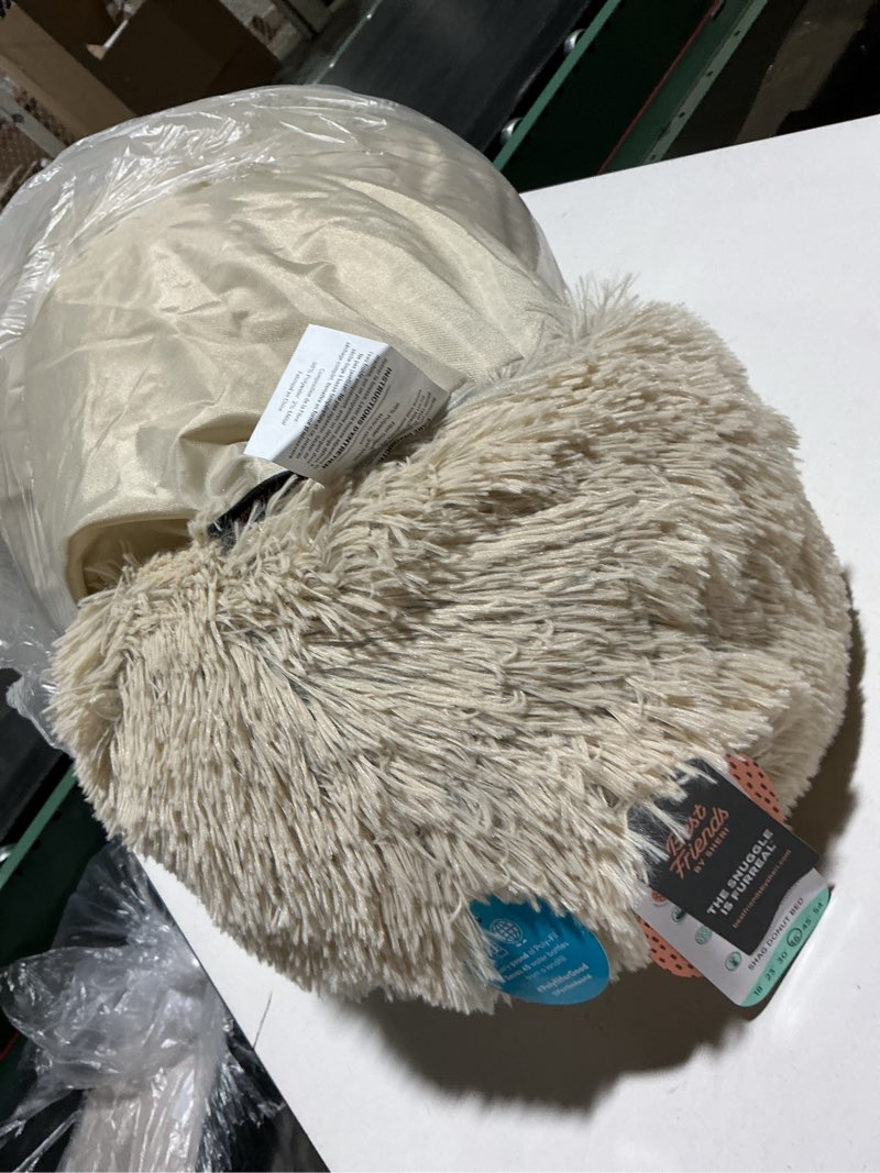 Condition photo showing As Is for best friends by sheri the original calming donut dog bed for large dogs up to 100 lbs, shag faux fur, taupe, large, 36" x 36" taupe shag large