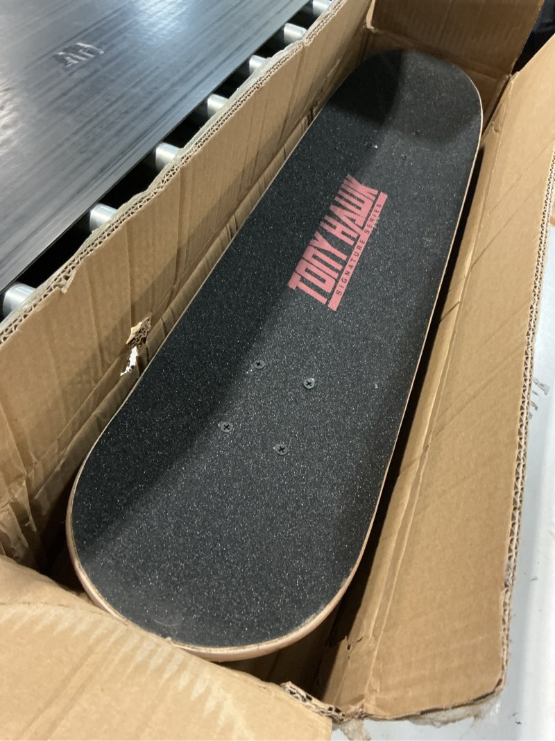 Condition photo showing Good Condition for tony hawk 31" skateboard - signature series 1 skateboard with pro trucks, full grip tape, 9-ply maple deck, ideal for all experience levels video game