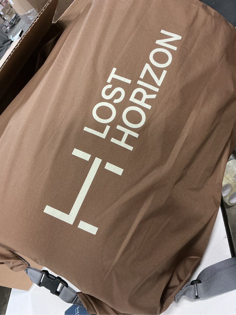 Condition photo showing As Is for (size unknown)lost horizon air & foam camping mattress, self-inflating sleeping pad, 4.5\" thick, with pump sack,  brown,  mattress only