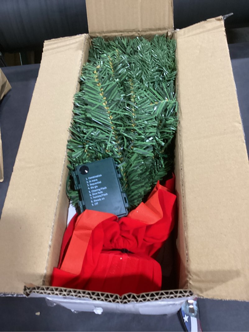 Condition photo showing New/Like New for JOIEDOMI 24"/2FT Pre-lit Tree with Oversized Velvet Bow Topper Artificial Christmas Tabletop Tree with 98 PE & PVC Branch Tips 50 LED Lights, Battery Operated for Xmas Indoor Every Room Tree Decor