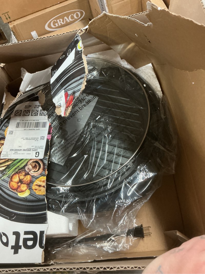 Condition photo showing As Is for elite gourmet emg-980bx large indoor electric round nonstick grill cool touch fast heat up ideal low-fat meals dishwasher safe includes glass lid, 14", black granite