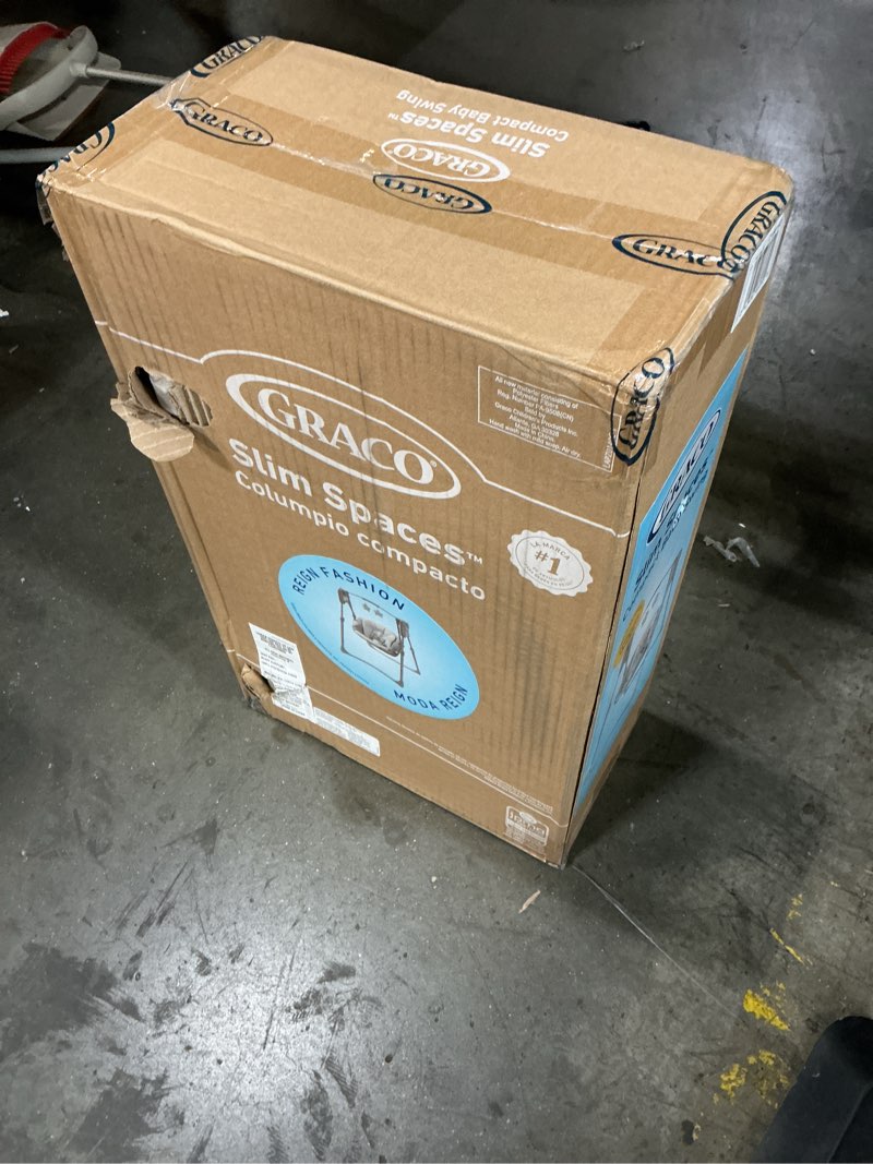 Condition photo showing New/Like New for graco slim spaces compact baby swing, space saving portable bay swing with height adjustable legs & soft toys, reign