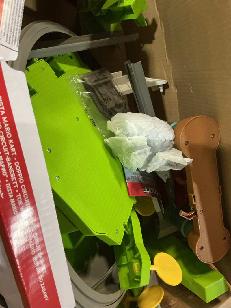 Condition photo showing As Is for Hot Wheels Mario Kart Circuit Track Set & 2 Toy Vehicles, Racing Playset Includes Booster, Plus Mario & Yoshi Karts (Amazon Exclusive) Mario Kart Track Set