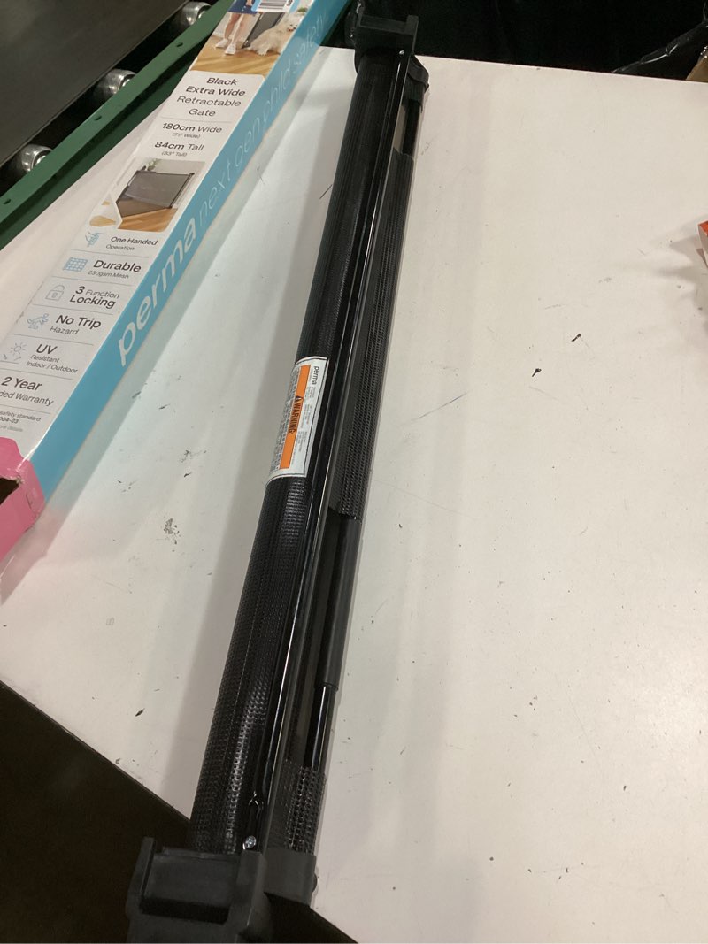 Condition photo showing Good Condition for retractable baby gate perma child safety 33" tall x 71” wide, mesh, for stairs, doorways, dogs, pets, indoor, outdoor, one-handed operation, locking, easy install, hardware mount, black black 33" tall x 71" wide