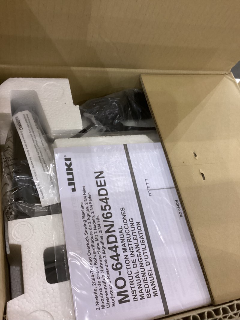 Condition photo showing As Is for Juki MO-600N Series, Industrial Strength Home Serger